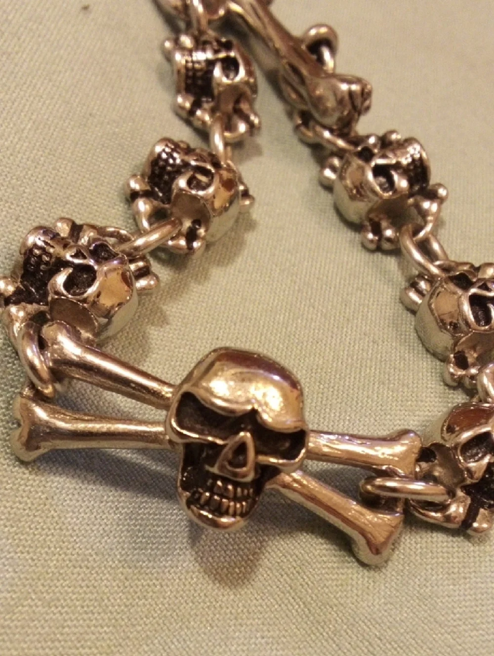Skull & Crossbones Chunky Bracelet in Metallic Gold Tone